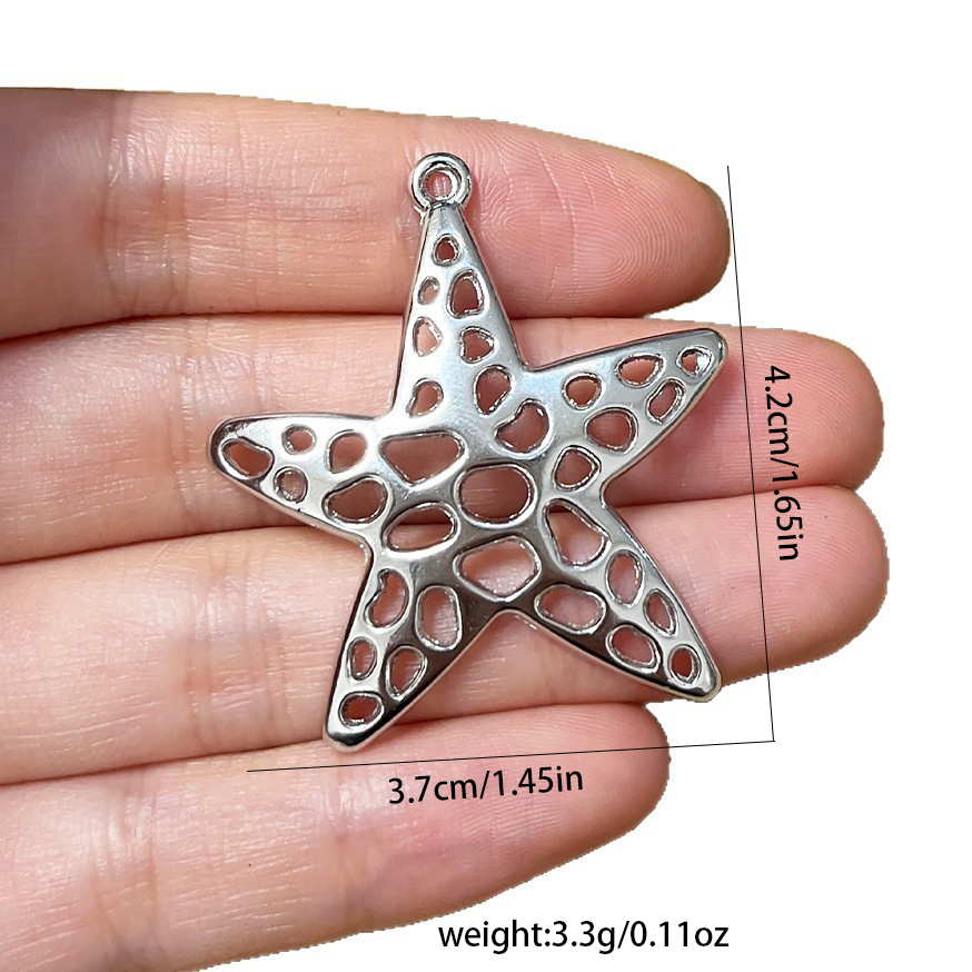 4 個の銀色のヒトデの海の星チャームペンダント、ネックレスジ - Vintage Fashion Blog のレビューと価格